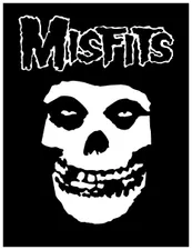 Simplistic Misfits logo saying 'MISFITS' in large black text with a white outline on a black background, under it, the Misfits skull